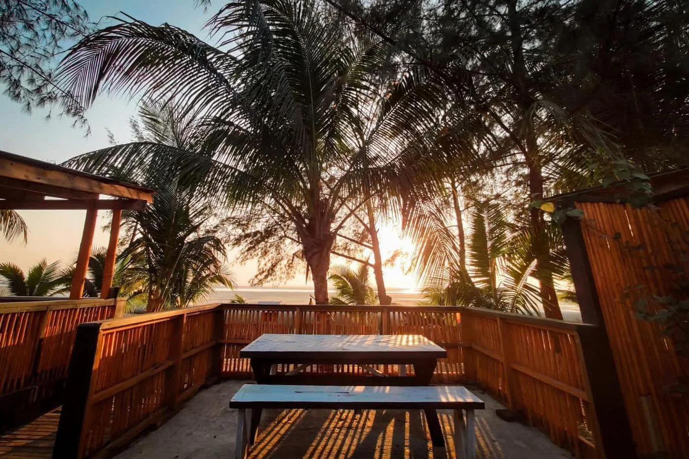 Mermaid's timber deck opening toward the sea
